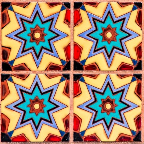 Real tile and architectural photography used as editorial inspiration. Not a photograph or approved color sample of Long Rectangle in Deep Navy.