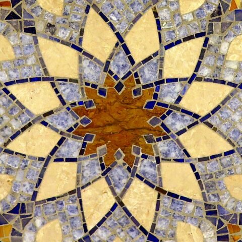 Photo of blue and beige geometric star mosaic; editorial reference, not supplier product